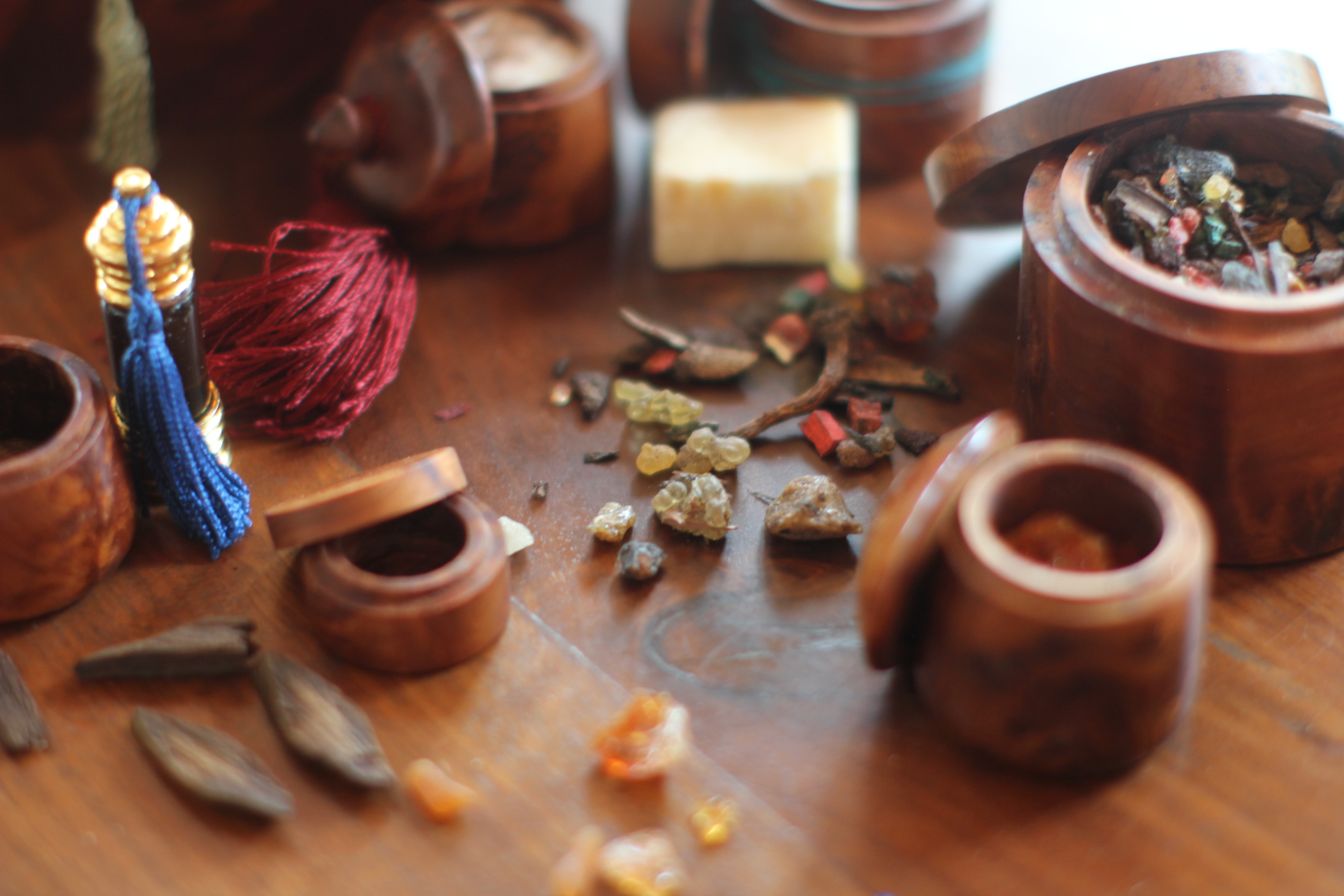 bowl filled with spices, cloves, moss
