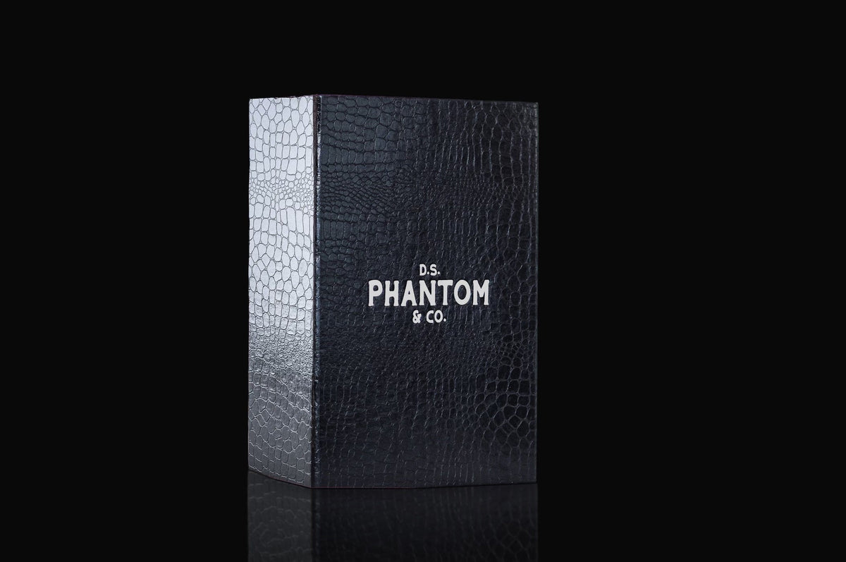 Black textured box designed to hold four Phantom candles