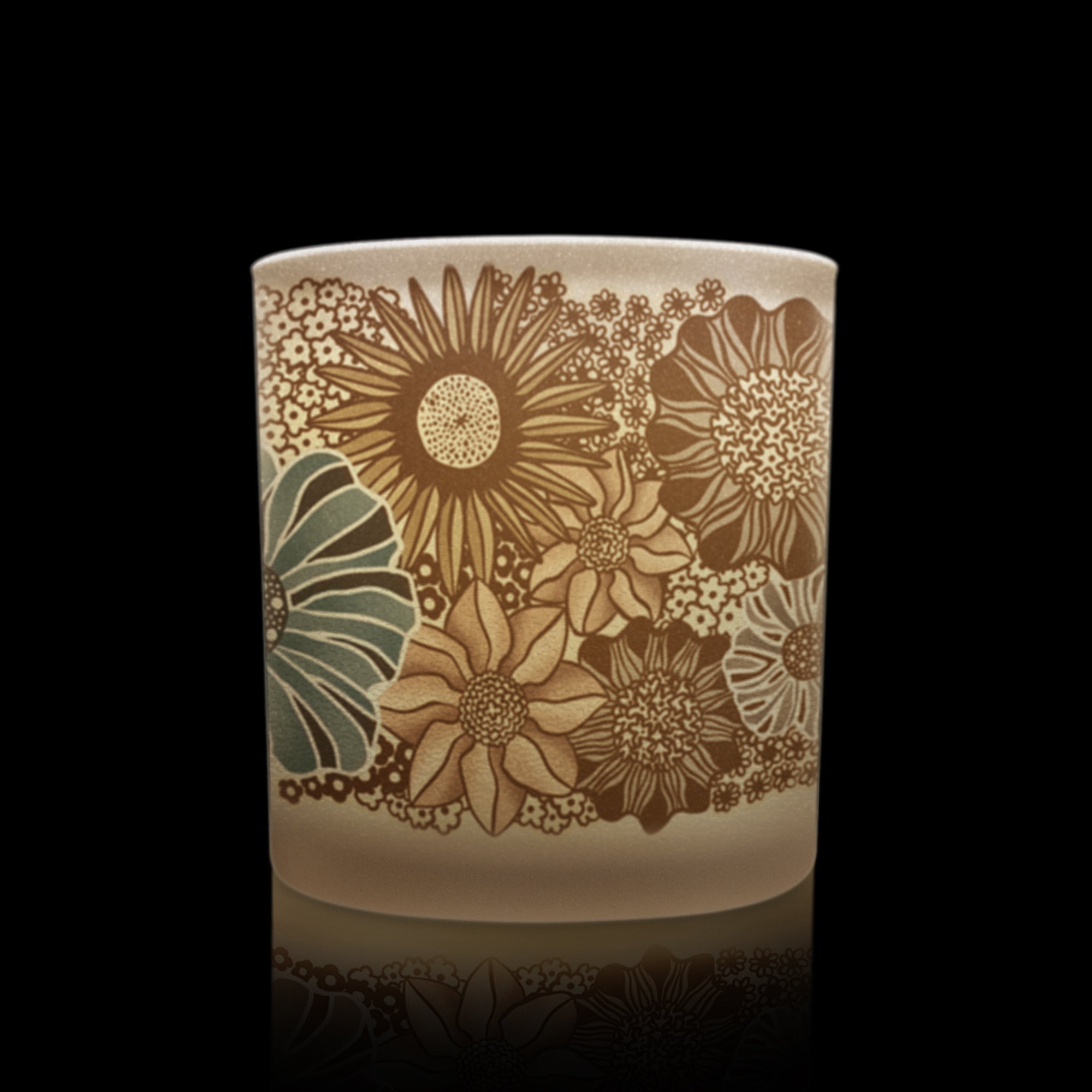  candle with a modern floral pattern on a frosted glass