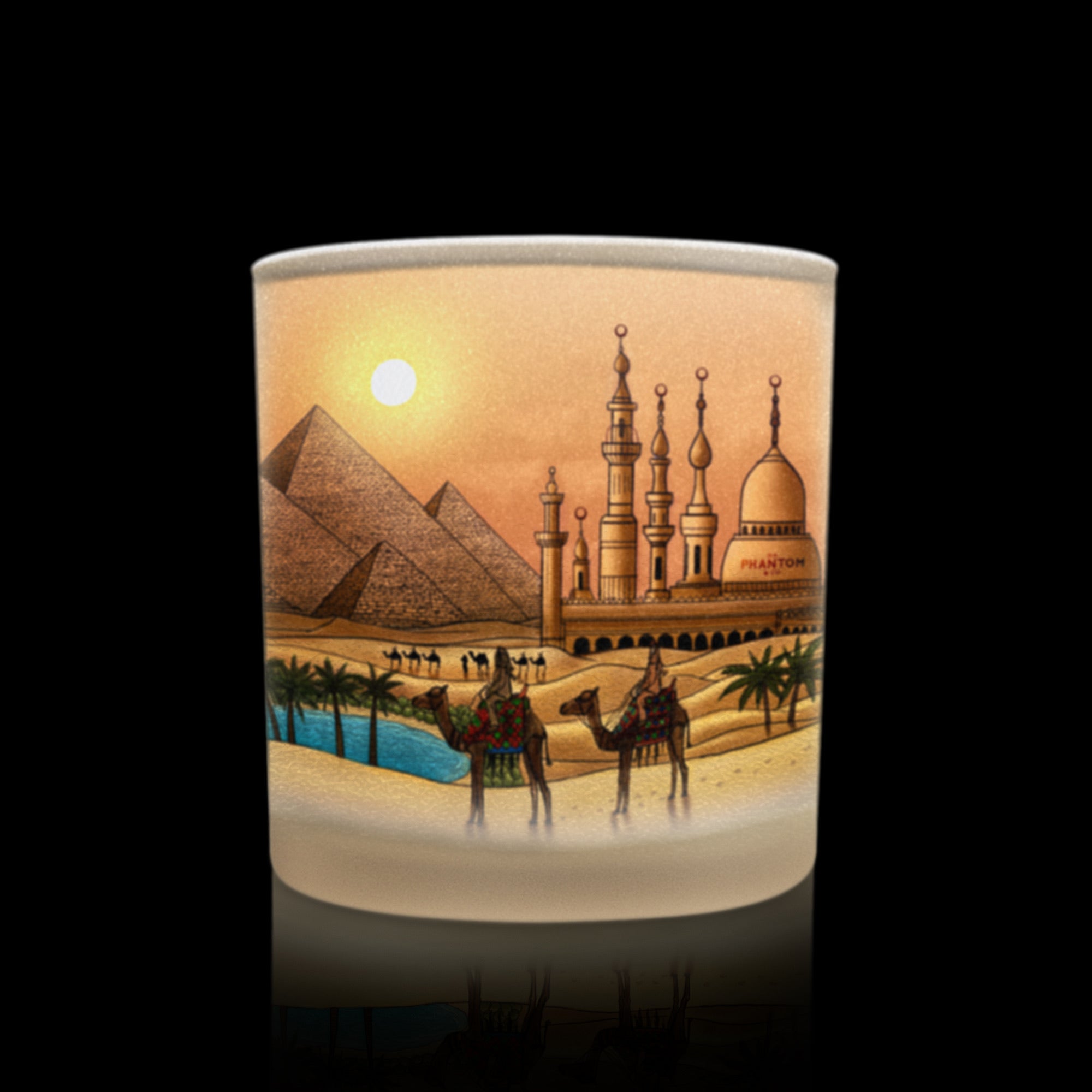candle with an Egyptian-themed design