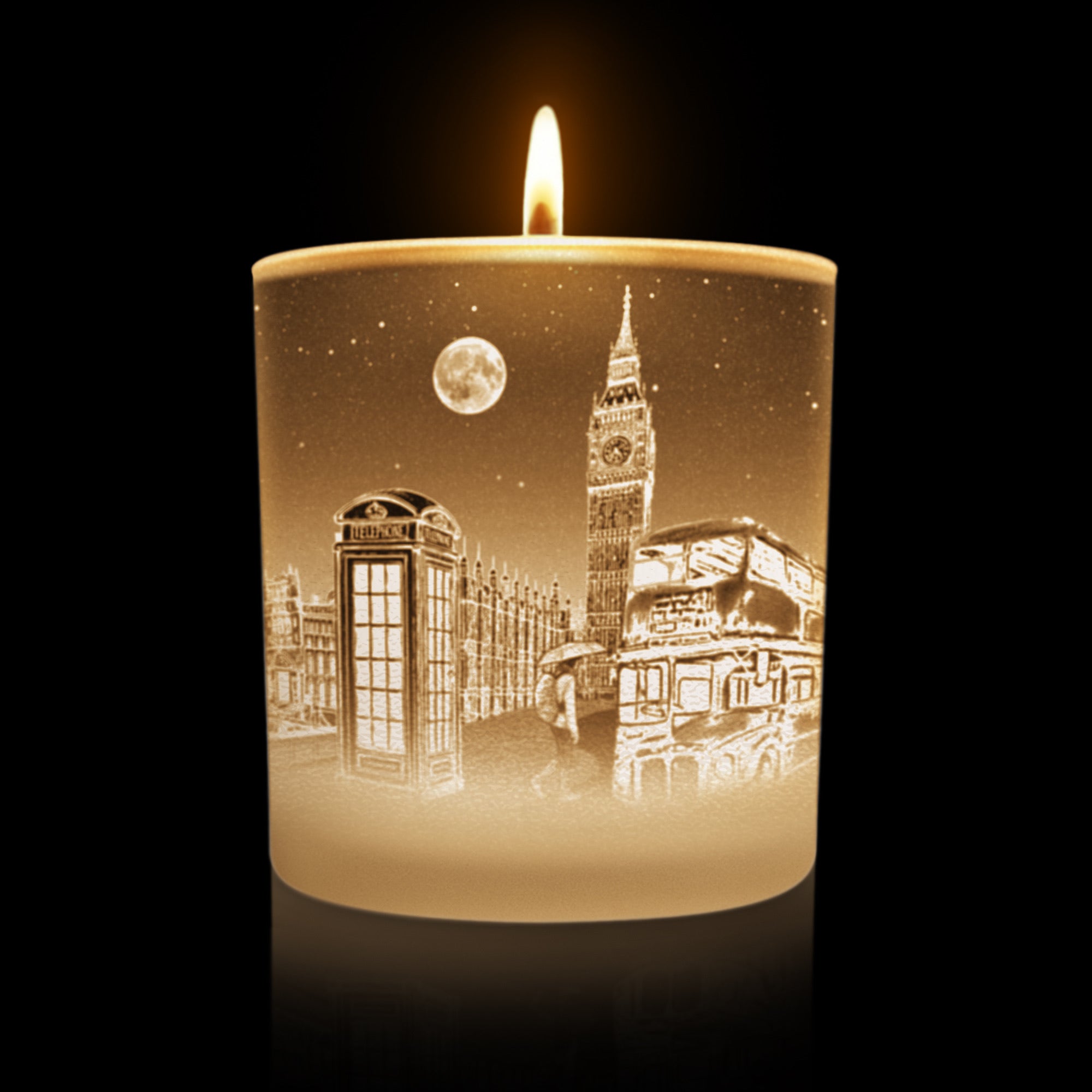 Lit candle with London themed city artwork