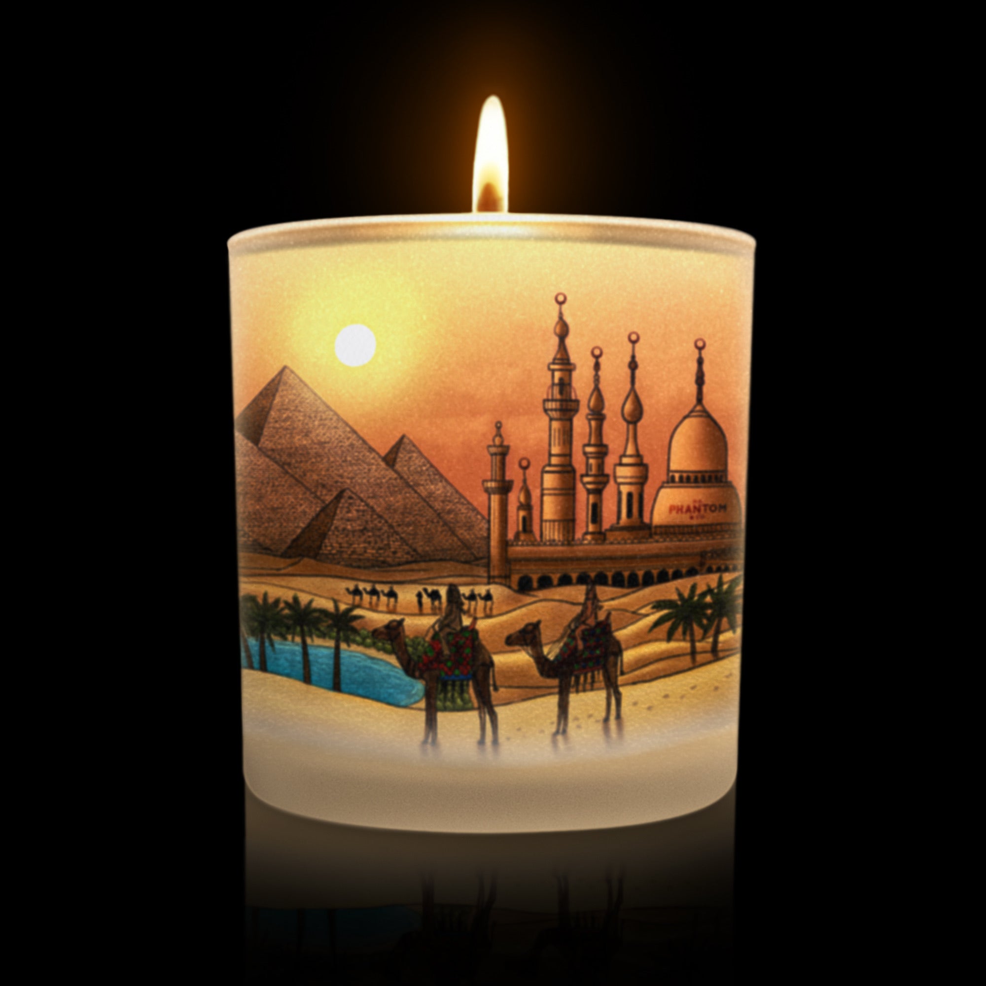  lit candle with an Egyptian-themed artwork