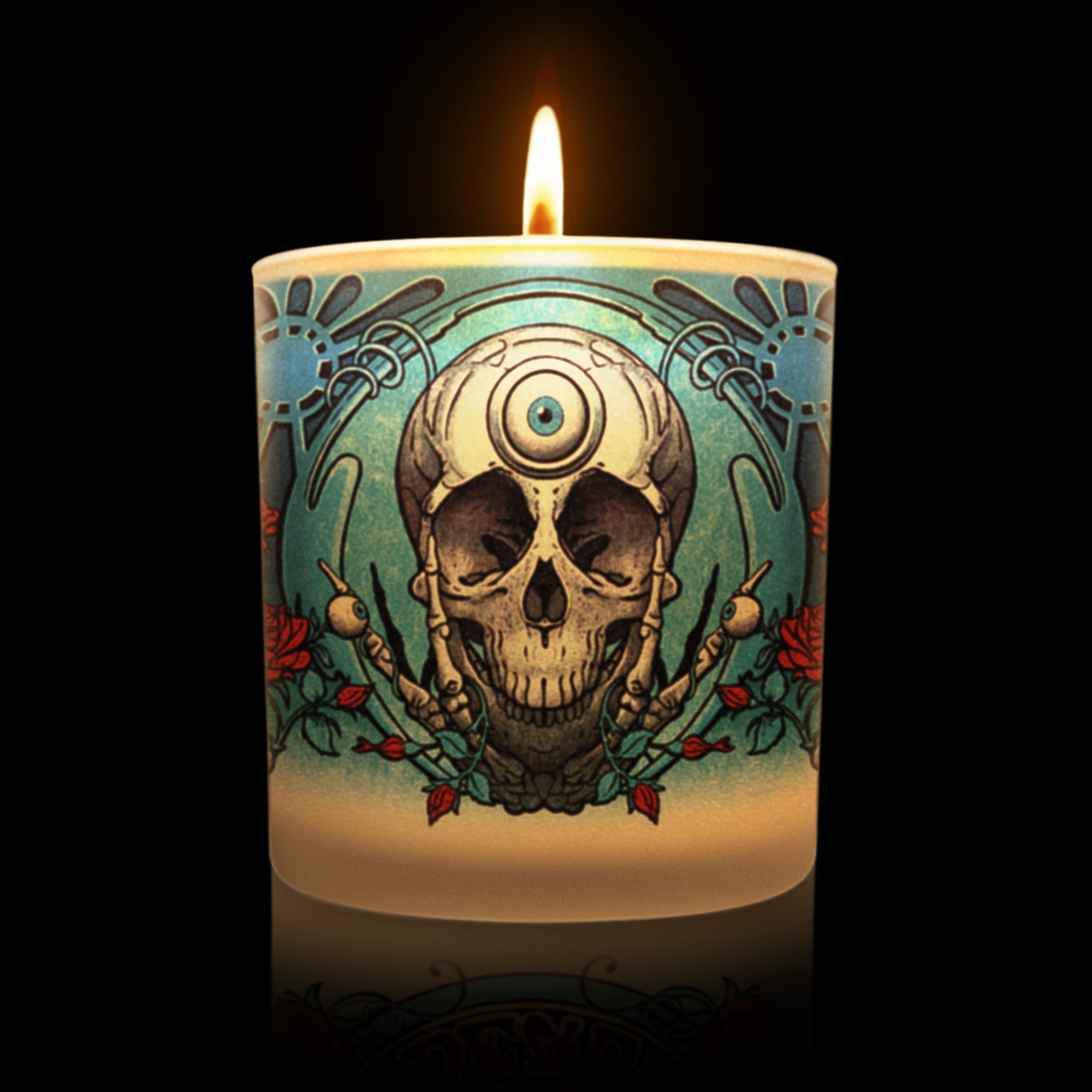 Lit candle showing Grateful Dead skull design with flowers.