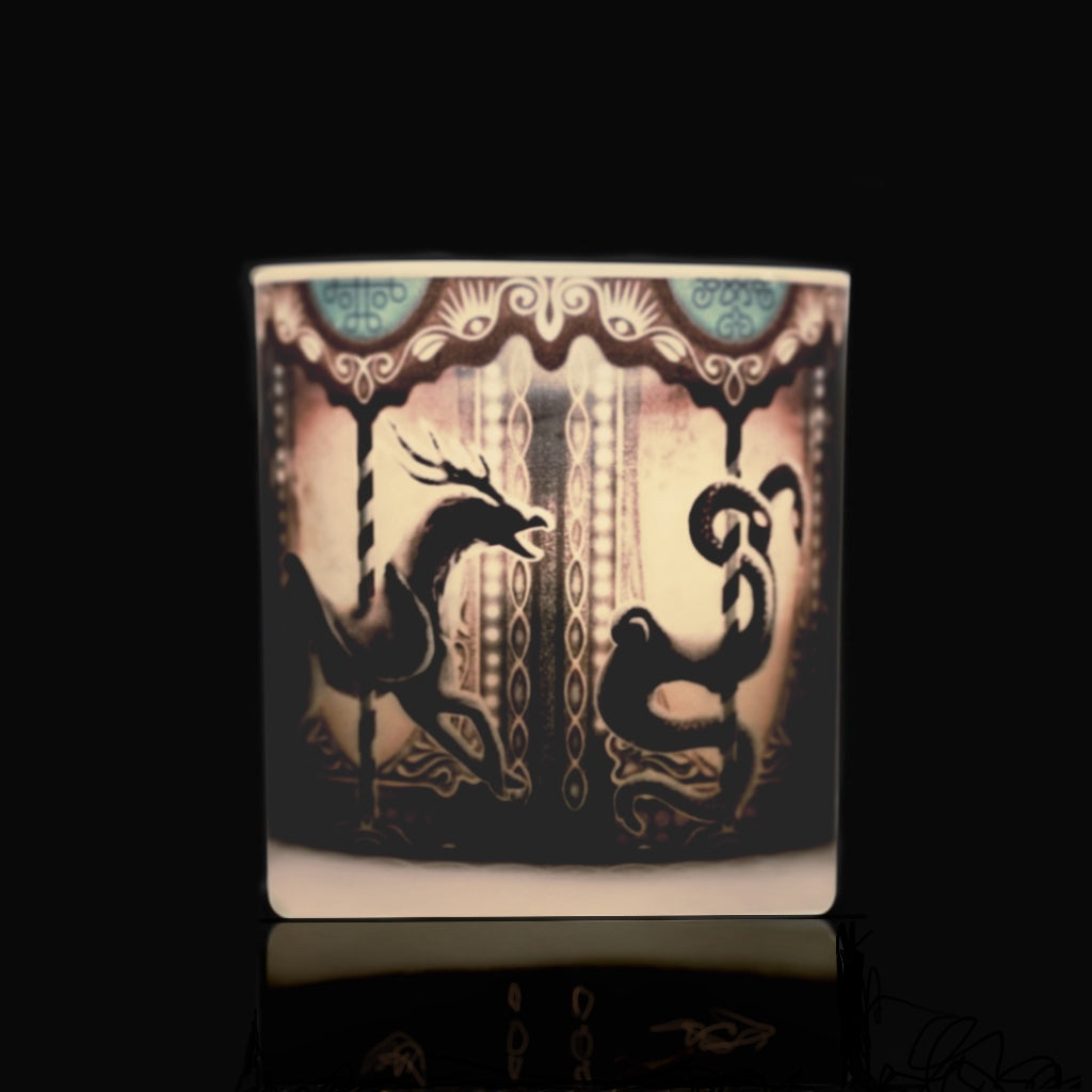 DS Phantom candle with artwork of a mythological carousel 