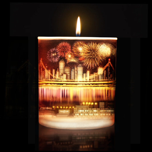 Lit candle with 360 artwork of San Francisco night skyline